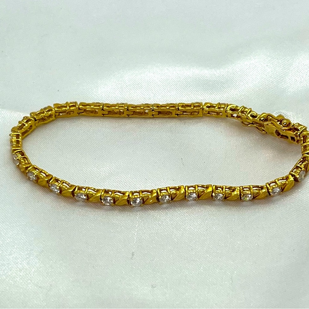 7 1/2” Tennis Bracelet Gold Tone Glass Rhinestone  Signed DAC Deborah Armstrong